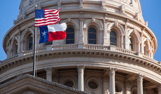 Texas-flag-at-state-capitol_c0-0-795-463_s561x327